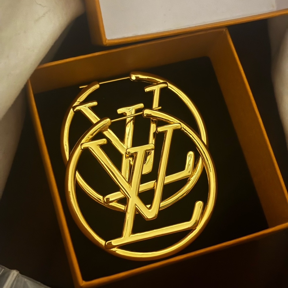 Gold Louis Vuitton hoop earrings